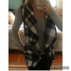Black, grey, and white plaid vest